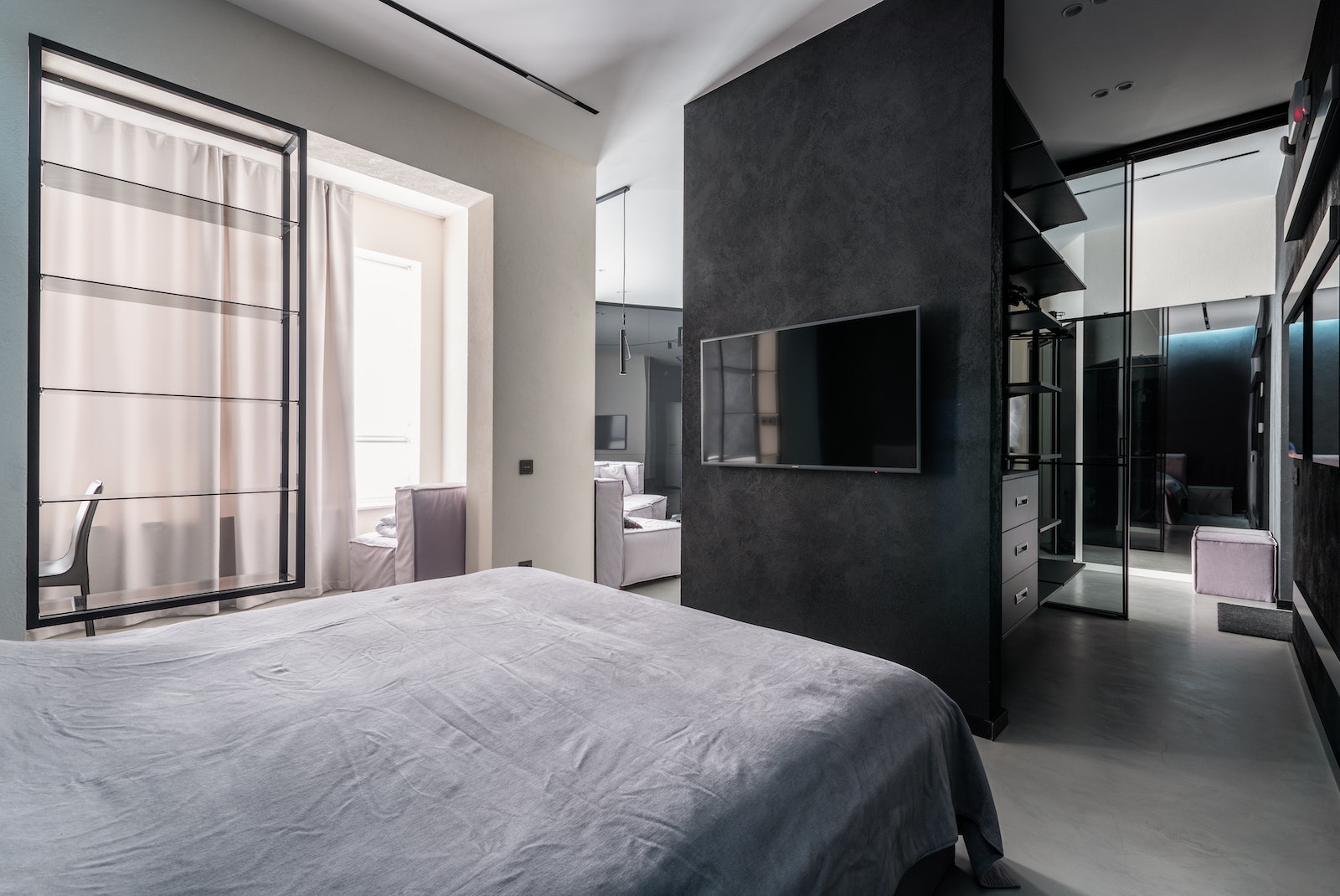 Modern bedroom in spacious apartment